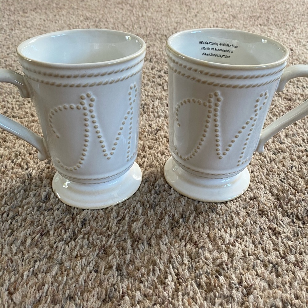 Two M initial mugs